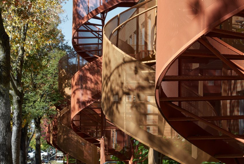 Montreal housing complex by Saia Barbarese Topouzanov renovated with colourful spiral staircases