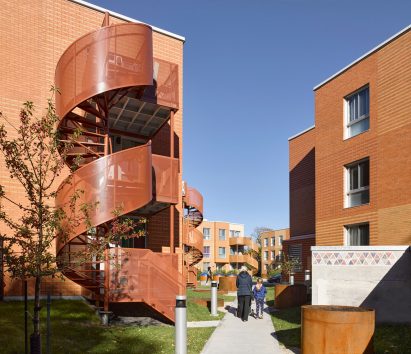 Deep orange spiral staircase