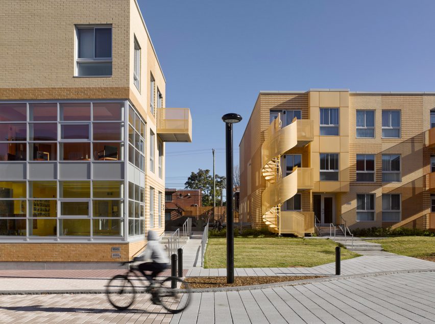 Montreal housing complex by Saia Barbarese Topouzanov renovated with colourful spiral staircases