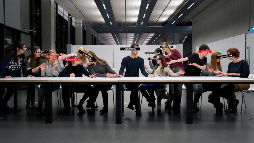 Figures sit at a long table with different words over their eyes
