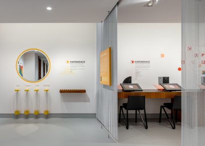 A mirror and vertical cylinders