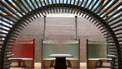 Co-working booths under an archway