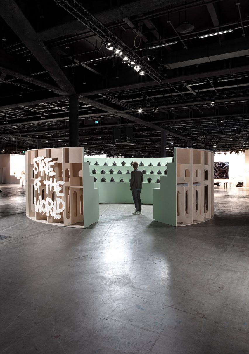 A man stands inside Mathieu Lehanneur's sculpture exhibition