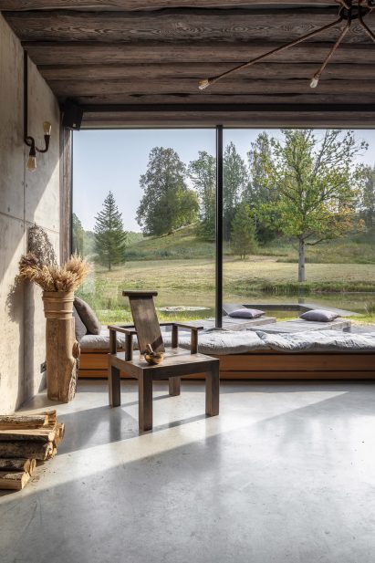 A window seat was placed against a glazed wall at Ziedlejas Spa and Wellness Resort