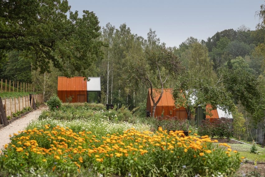 Corten steel and glass cabins at Ziedlejas Spa and Wellness Resort by Open AD