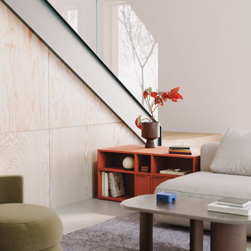 Dark orange shelving unit under window