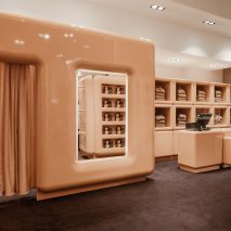 The beige interior of SKIMS pop up store in Paris