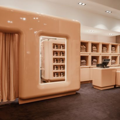 The beige interior of SKIMS pop up store in Paris