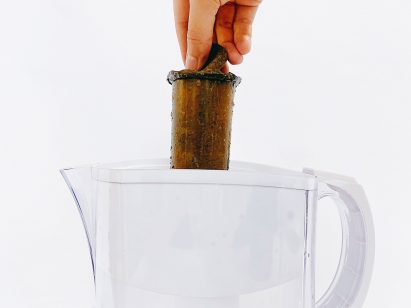 Water filter cartridge made from food waste biochar by Charlotte Böhning and Mary Lempres