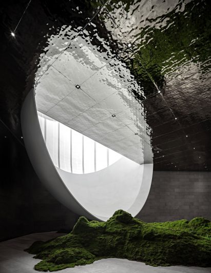 Light reflects of the ceiling of an internal hall at The Hometown Moon