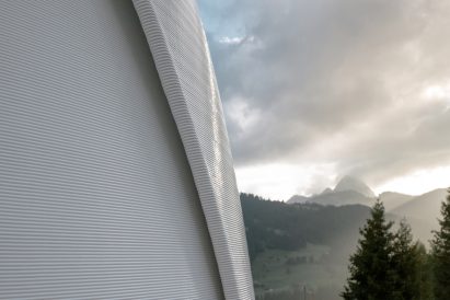 Ribbed, 3D-printed surface of recycled plastic portaloo by To.org and Nagami