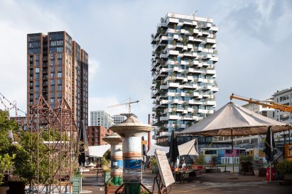 Trudo vertical forest pictured beside another residential tower