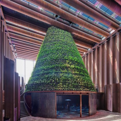 Plant-covered cone stands in the middle of the Dutch Biotope pavilion at Expo 2020 Dubai