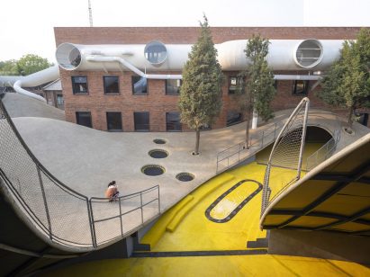 Cut out areas were painted bright yellow at the playscape childrens community centre