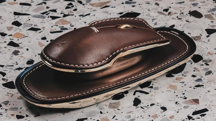 A photograph of a leather mouse