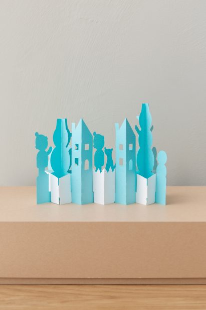 A photograph of a snowman Christmas card by Muji