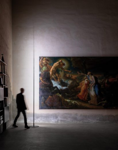 A photograph of the Origine light in an art gallery