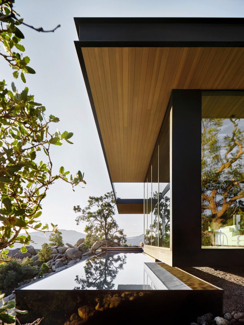 A pool on the edge of High Desert Retreat house