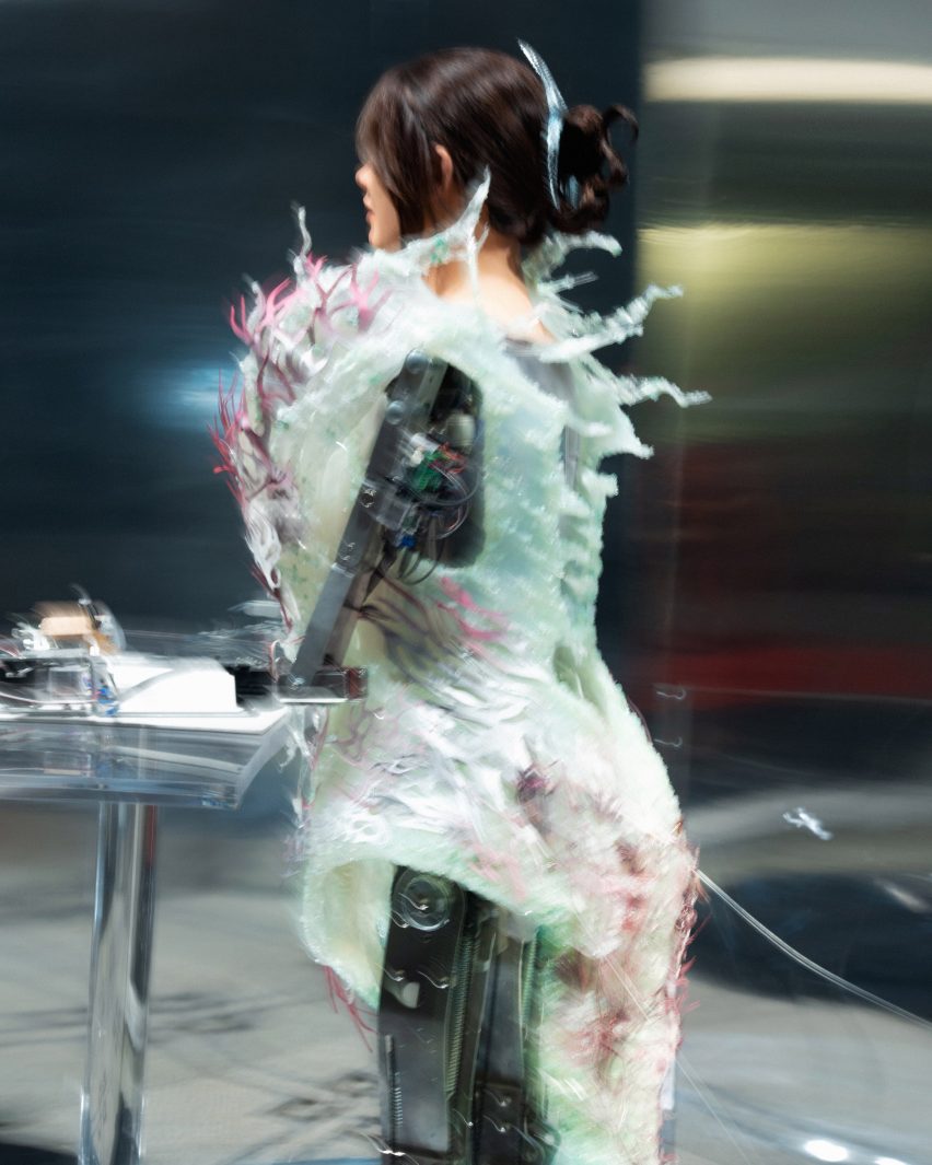 A robot wearing a blue dress