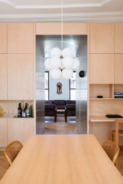 View through millwork block from kitchen to living room