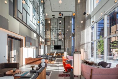 A lounge has glass walls at Brooklyn Point