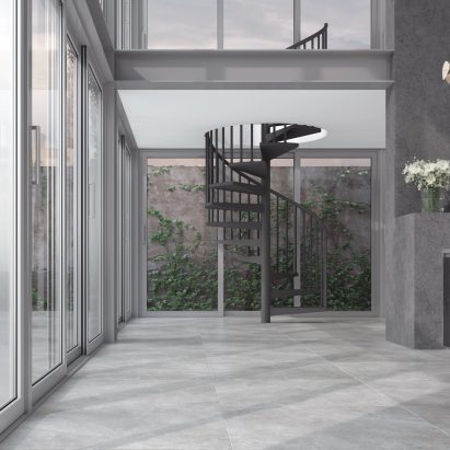 Calcaria porcelain tiles used in a residential interior as well as the flooring of an outdoor swimming pool