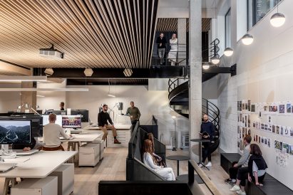 Employees work and take breaks in the open plan office