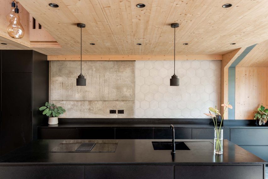 Kitchen with black cabinets