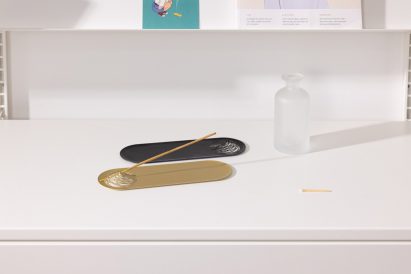A photograph of an incense stick holder by DSLSM