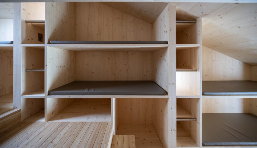 Bivouac Fanton is a hikers cabin in Italy that was designed by Demogo