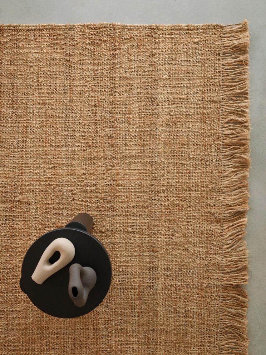A small table on a sand coloured rug