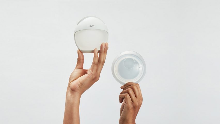 Elvie Curve and Elvie Catch breast pumps being held up by two hands