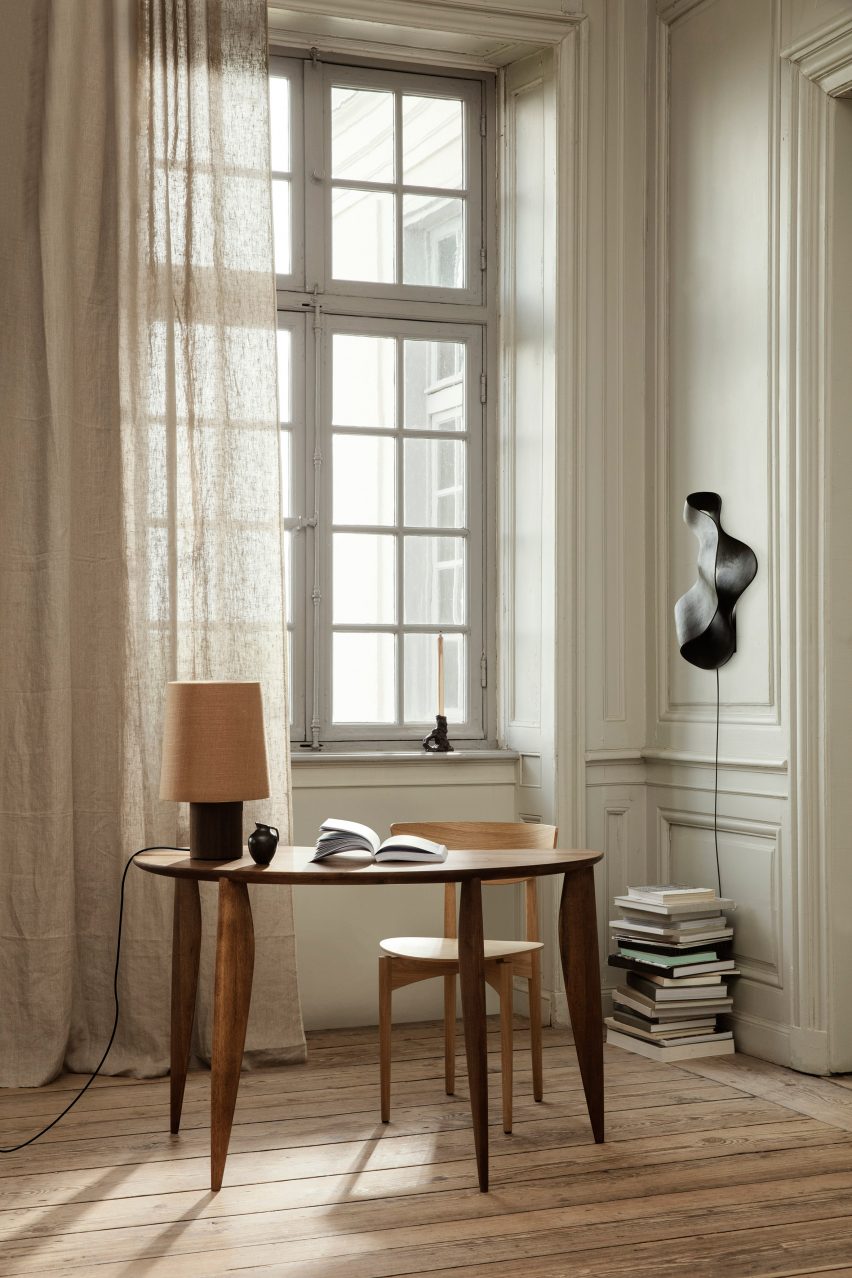 A photograph of the brown wooden Feve desk