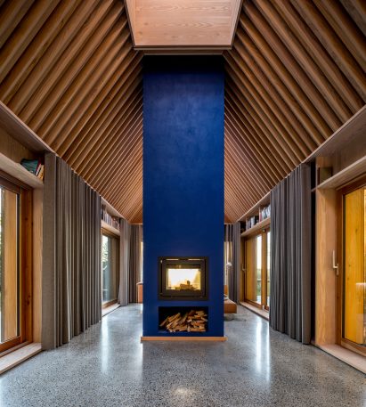 A chimney breast was painted a deep blue