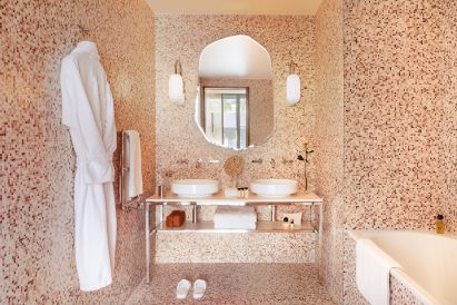 Pink mosaic tiled bathroom