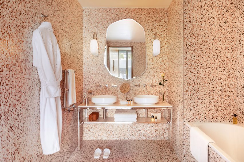 Pink mosaic tiled bathroom