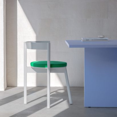 A photograph of the Jazz dining chair with slanted front leg