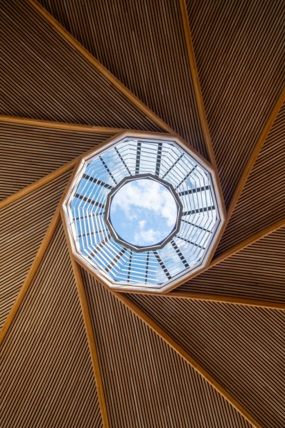 Reciprocal frame roof structure
