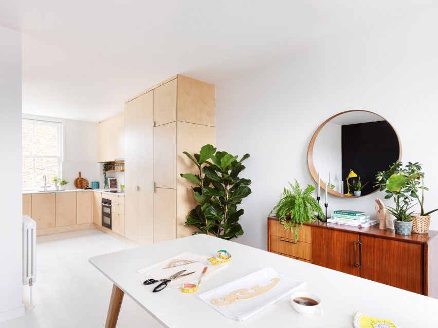 White kitchen with wooden cabinets
