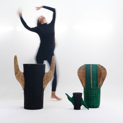 A woman danced next to crafts at Expo 2020 Dubai