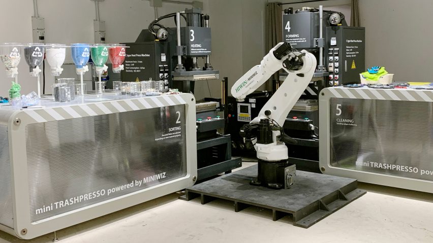 Mini Trashpresso recycling machine with robot arm and sorting bins