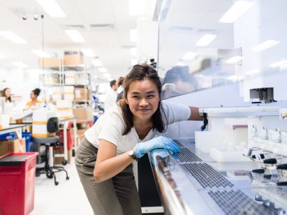A woman working in a science lab