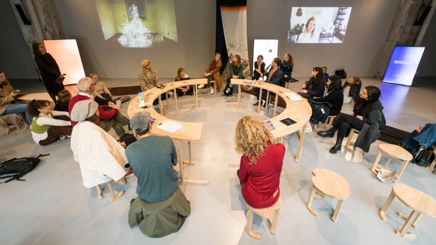 A group of people sitting in a ring