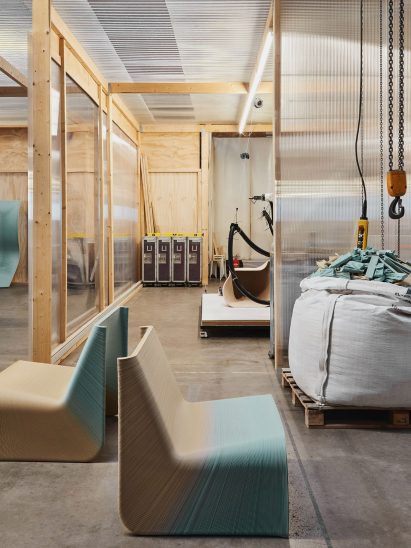 Two chairs by The New Raw in an industrial warehouse