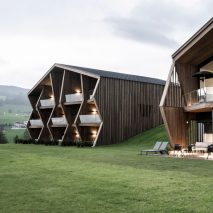 Aeon Hotel is a timber-clad hotel in Italy with a jagged facade
