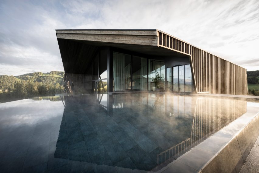 Aeon Hotel is a timber-clad hotel in Italy that was designed by NOA