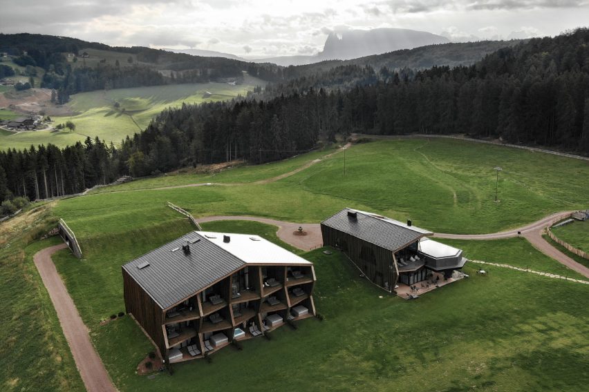 Aeon Hotel is a timber-clad hotel in Italy that was designed by NOA