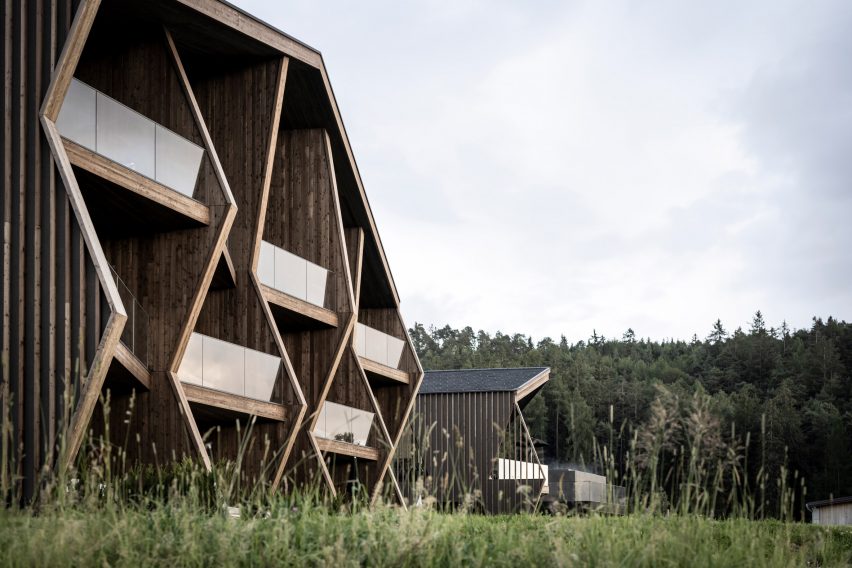 Aeon Hotel is a timber-clad hotel in Italy that was designed by NOA