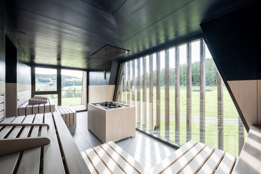 Aeon Hotel is a timber-clad hotel in Italy that was designed by NOA