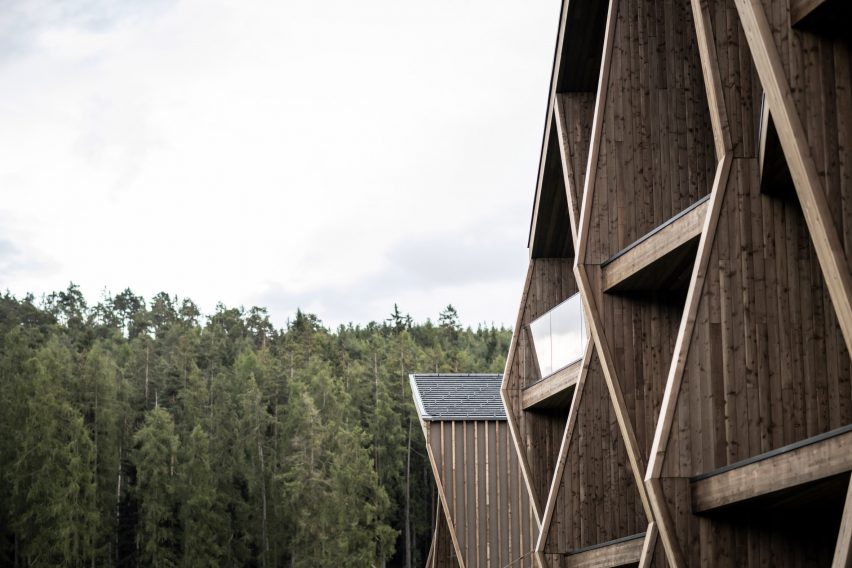 Aeon Hotel is a timber-clad hotel in Italy that was designed by NOA